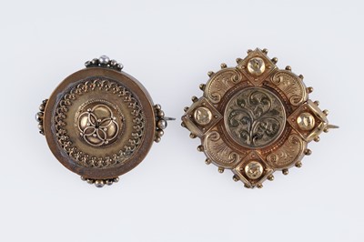 Lot 9 - A Victorian gold Gothic Revival brooch; and a boss-form brooch