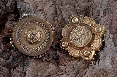 Lot 9 - A Victorian gold Gothic Revival brooch; and a boss-form brooch