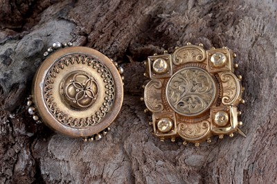Lot 9 - A Victorian gold Gothic Revival brooch; and a boss-form brooch