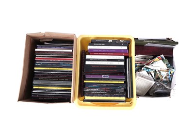 Lot 416 - A collection of empty Royal Mail special stamp books; and postcards