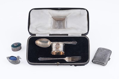 Lot 407 - A Victorian silver cigarette case; a Christening set; and a silver pill box