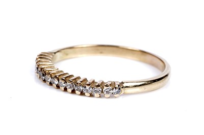 Lot 118 - A modern diamond half-hoop eternity ring