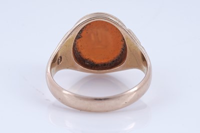 Lot 24 - A Victorian banded carnelian and 15ct gold signet ring | dated 1897