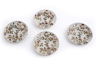 Lot 372 - A collection of four early 20th Century Zsolnay Pecs saucers