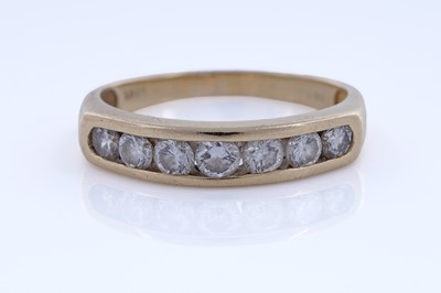 Lot 51 - A contemporary seven-stone diamond eternity ring