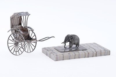 Lot 388 - An early 20th Century Anglo-Indian novelty mammoth tooth paperweight, and Chinese rickshaw