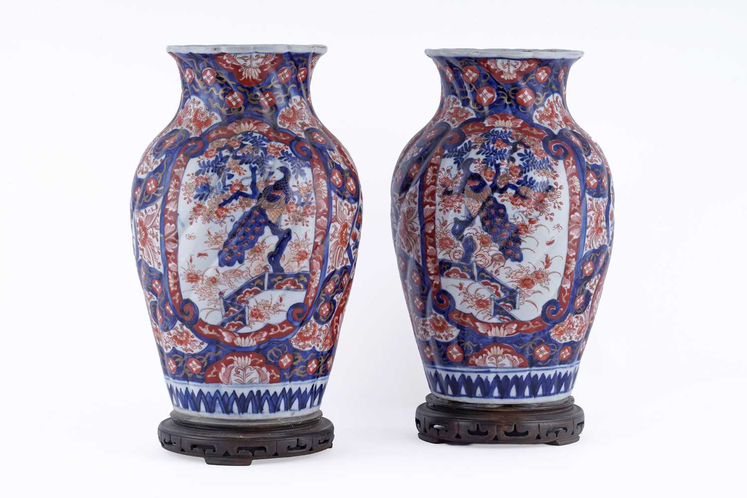 Lot 838 - A pair of Japanese Imari vases