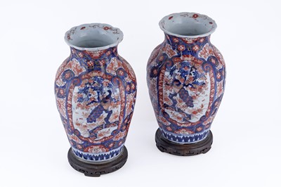 Lot 838 - A pair of Japanese Imari vases