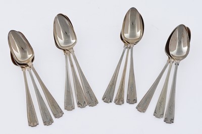 Lot 384 - A set of twelve silver gilt coffee spoons with engraved presentation inscription to Daphne