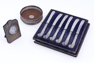 Lot 381 - A cased set of six Edwardian silver pistol-handled butter knives; and other items