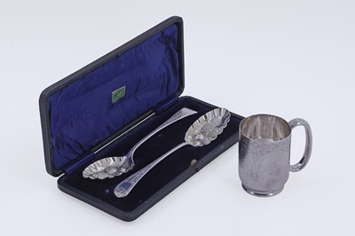 Lot 428 - A Victorian silver Aesthetic Movement cup, and a cased pair of "berry" spoons