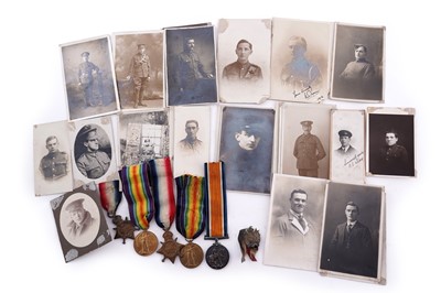 Lot 6 - WWI medals; and photographic postcards