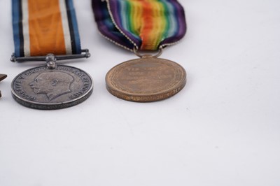 Lot 6 - WWI medals; and photographic postcards