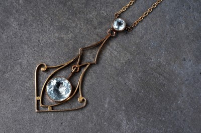 Lot 26 - An Edwardian Art Nouveau aquamarine pendant