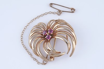 Lot 47 - A mid-20th Century ruby stylized firework pattern brooch