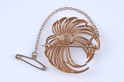 Lot 47 - A mid-20th Century ruby stylized firework pattern brooch