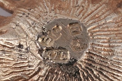 Lot 47 - A mid-20th Century ruby stylized firework pattern brooch