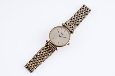 Lot 335 - Longine Le Grand Classique: a gilt steel cased lady's wristwatch