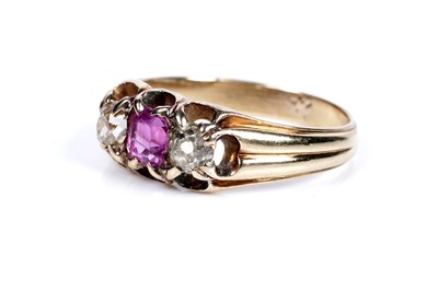 Lot 37 - An Edwardian pink sapphire and diamond three-stone ring