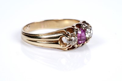 Lot 37 - An Edwardian pink sapphire and diamond three-stone ring