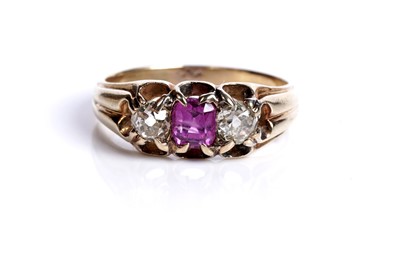 Lot 37 - An Edwardian pink sapphire and diamond three-stone ring