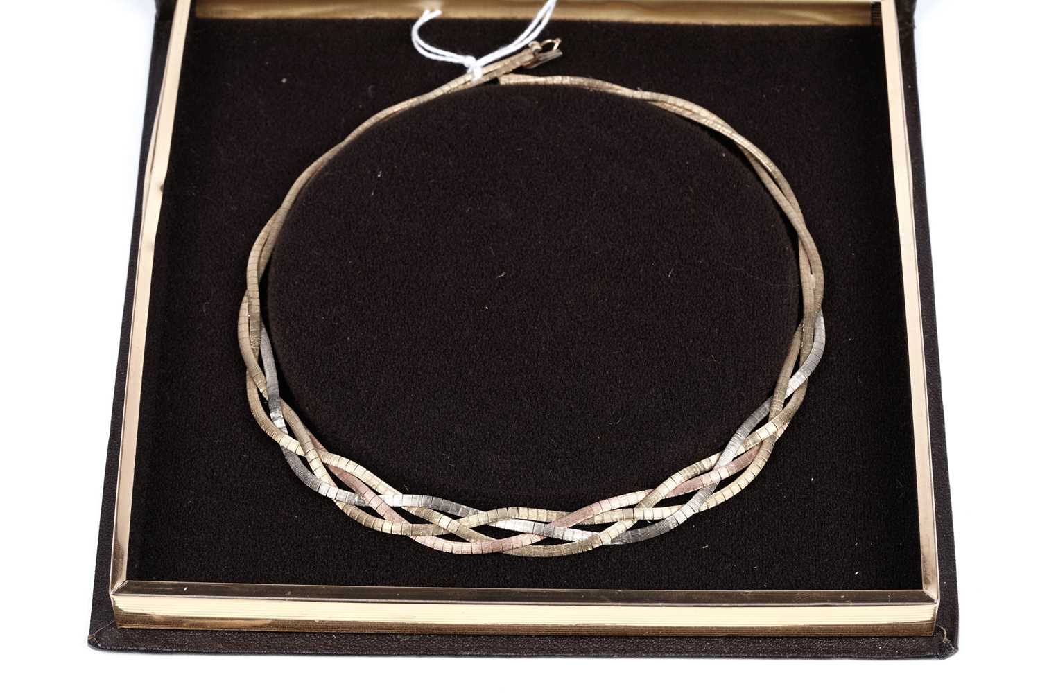 Lot 81 - A 1970's tricolour gold plaited necklace