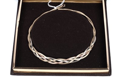 Lot 81 - A 1970's tricolour gold plaited necklace