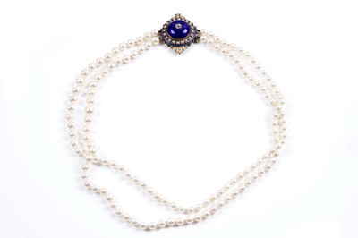 Lot 922 - A two-strand cultured pearl necklace with Victorian Etruscan Revival clasp