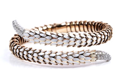 Lot 923 - Roberto Coin: a Snake Collection diamond and gold torque bracelet
