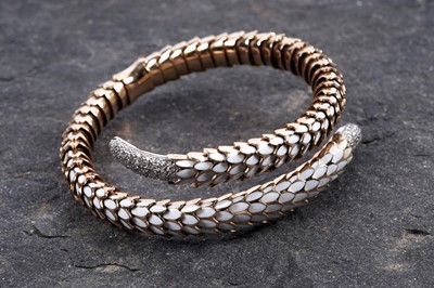 Lot 923 - Roberto Coin: a Snake Collection diamond and gold torque bracelet