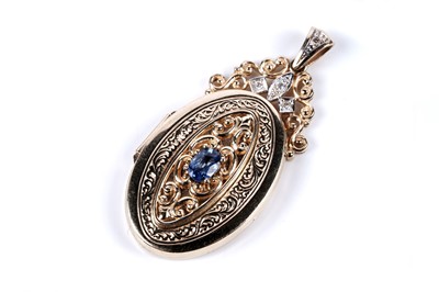 Lot 24 - An Edwardian style sapphire and diamond pendant locket