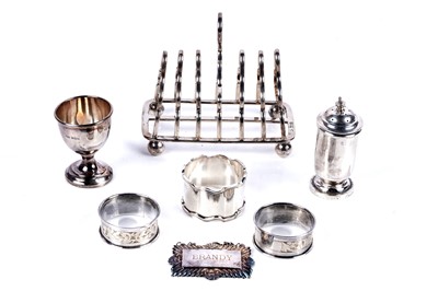 Lot 187 - Silver and silverplate items including: a silver Reid and Sons toast rack