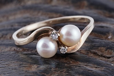 Lot 54 - A diamond and cultured pearl ring