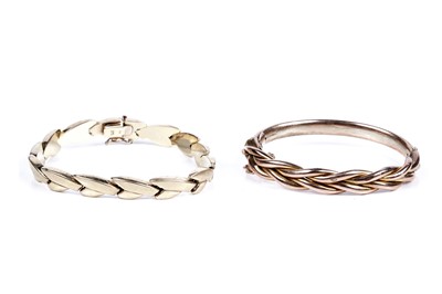 Lot 274 - A 9ct yellow gold bracelet; and a 9ct rose gold bangle