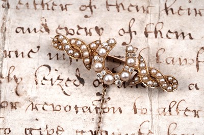 Lot 837 - A Victorian pearl and diamond horseshoe brooch