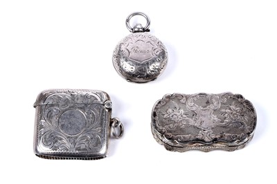 Lot 255 - A Victorian silver vinaigrette; and two silver cases