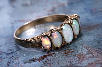 Lot 184 - A five-stone opal ring