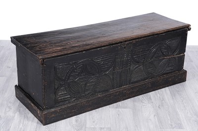 Lot 64 - A 17th Century and later carved oak coffer