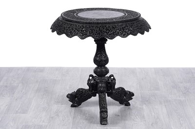 Lot 98 - A late 19th Century Burmese carved hardwood occasional table