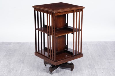 Lot 84 - An Edwardian inlaid mahogany revolving bookcase
