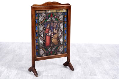 Lot 70 - An early 20th Century mahogany and stained-glass fire screen