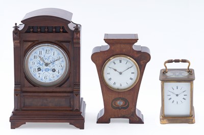 Lot 156 - An early 20th Century Japy Freres walnut mantel clock; another mantel clock; and a carriage clock