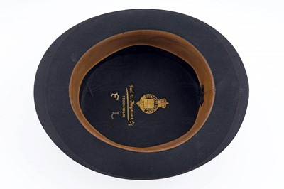 Lot 277 - A silk top hat by Paul U Bergstroms AB Stockholm; and a small Georgian police truncheon