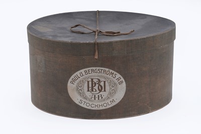 Lot 277 - A silk top hat by Paul U Bergstroms AB Stockholm; and a small Georgian police truncheon