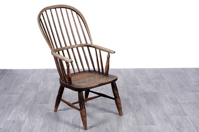 Lot 48 - A 19th Century ash and oak spindle back Windsor armchair