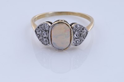 Lot 61 - An Edwardian Art Nouveau opal and diamond ring