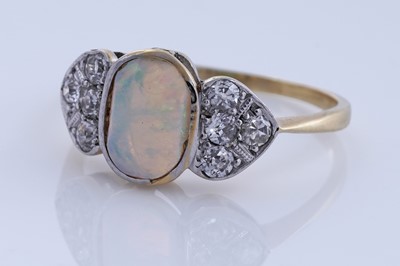 Lot 61 - An Edwardian Art Nouveau opal and diamond ring