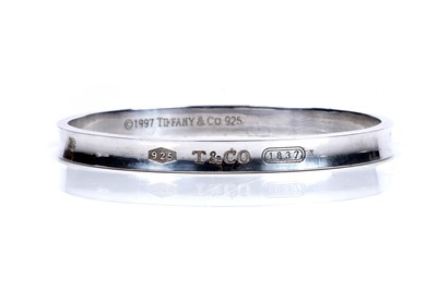 Lot 67 - A Tiffany and Co sterling silver bangle
