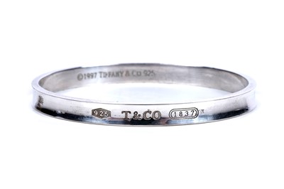 Lot 67 - A Tiffany and Co sterling silver bangle