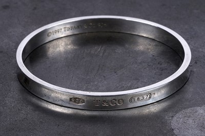 Lot 67 - A Tiffany and Co sterling silver bangle
